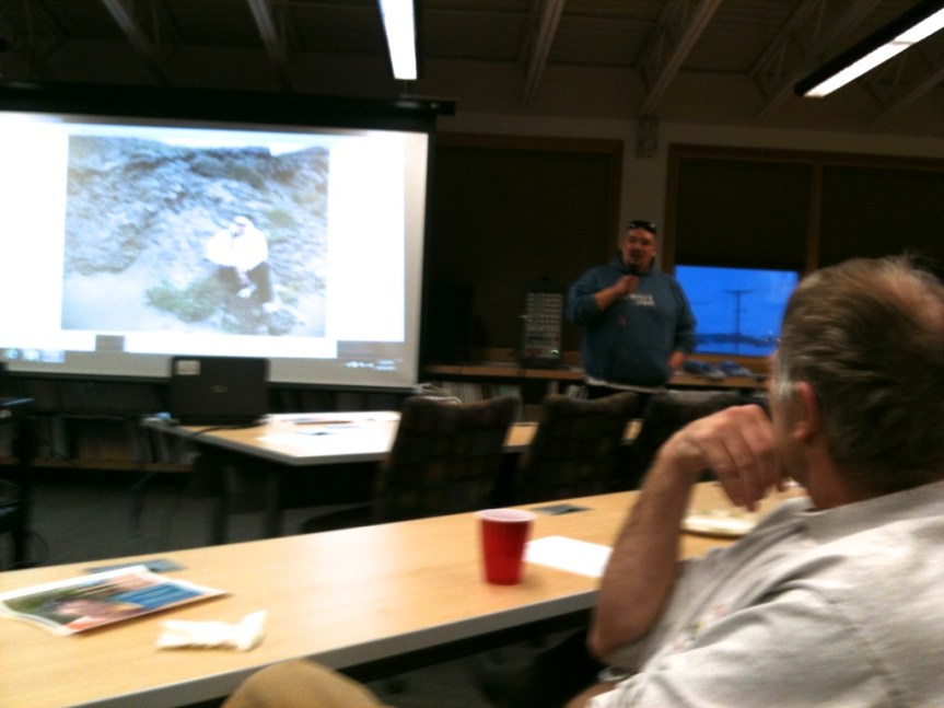 Dan Lum showing slides of the photos in his book