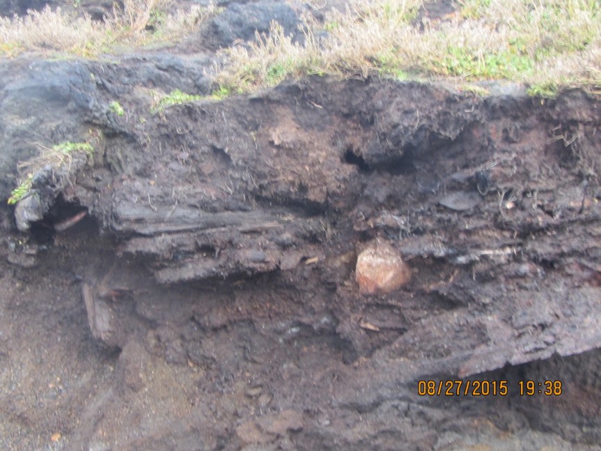 Closeup of eroding structure from the beach.