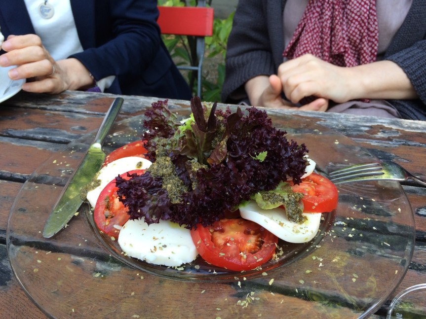 Seriously large (and very carefully arranged) caprese salad).