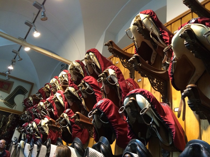 Saddles in the tack room at the Winter Riding School.
